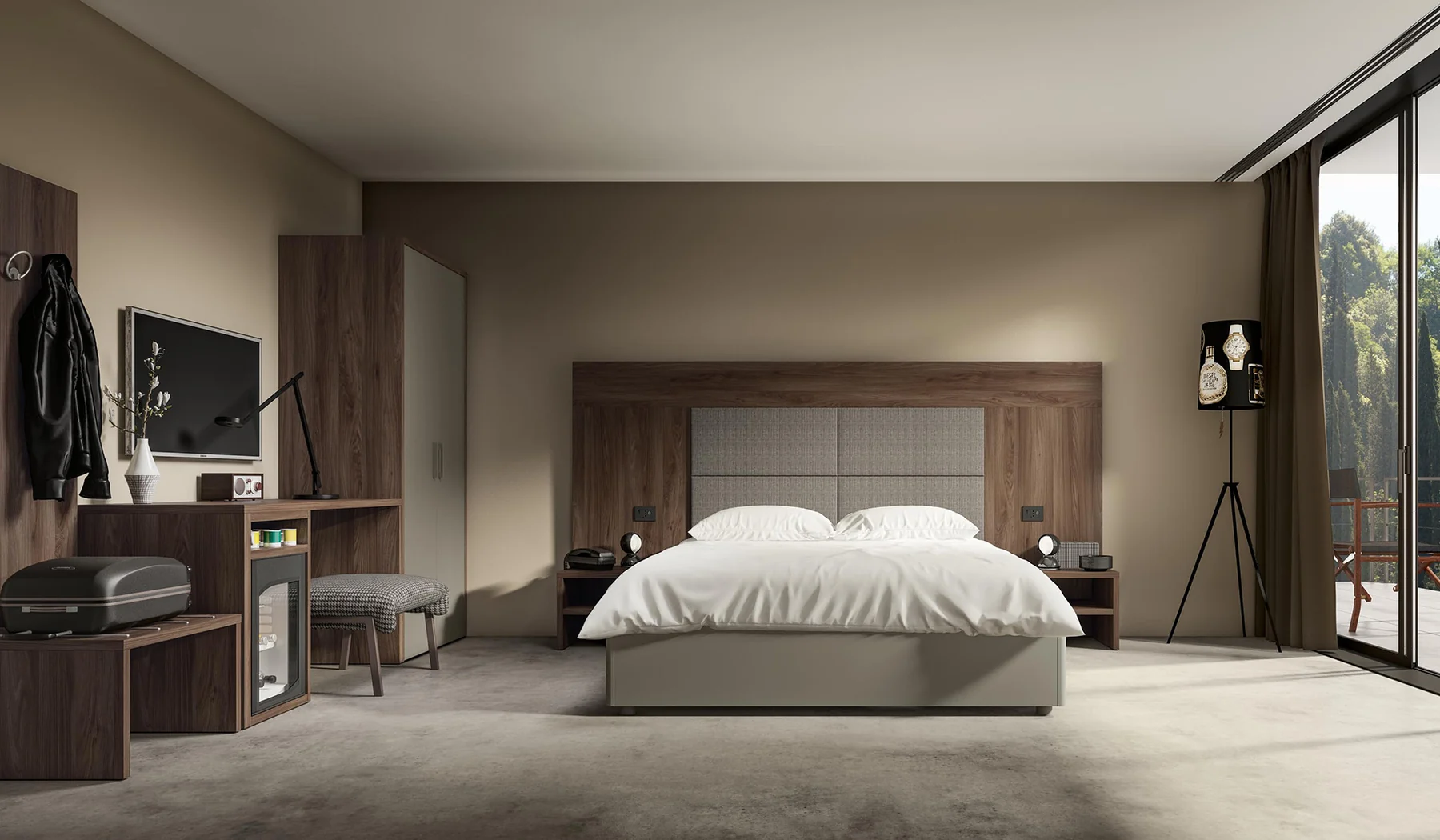 Ambientazione hotel Marka con letto matrimoniale e arredi coordinati